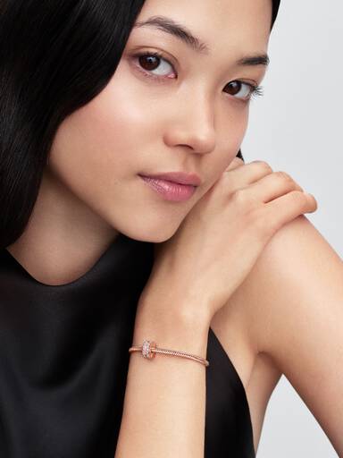 14k rose gold-plated clip with clear cubic zirconia and silicone grip