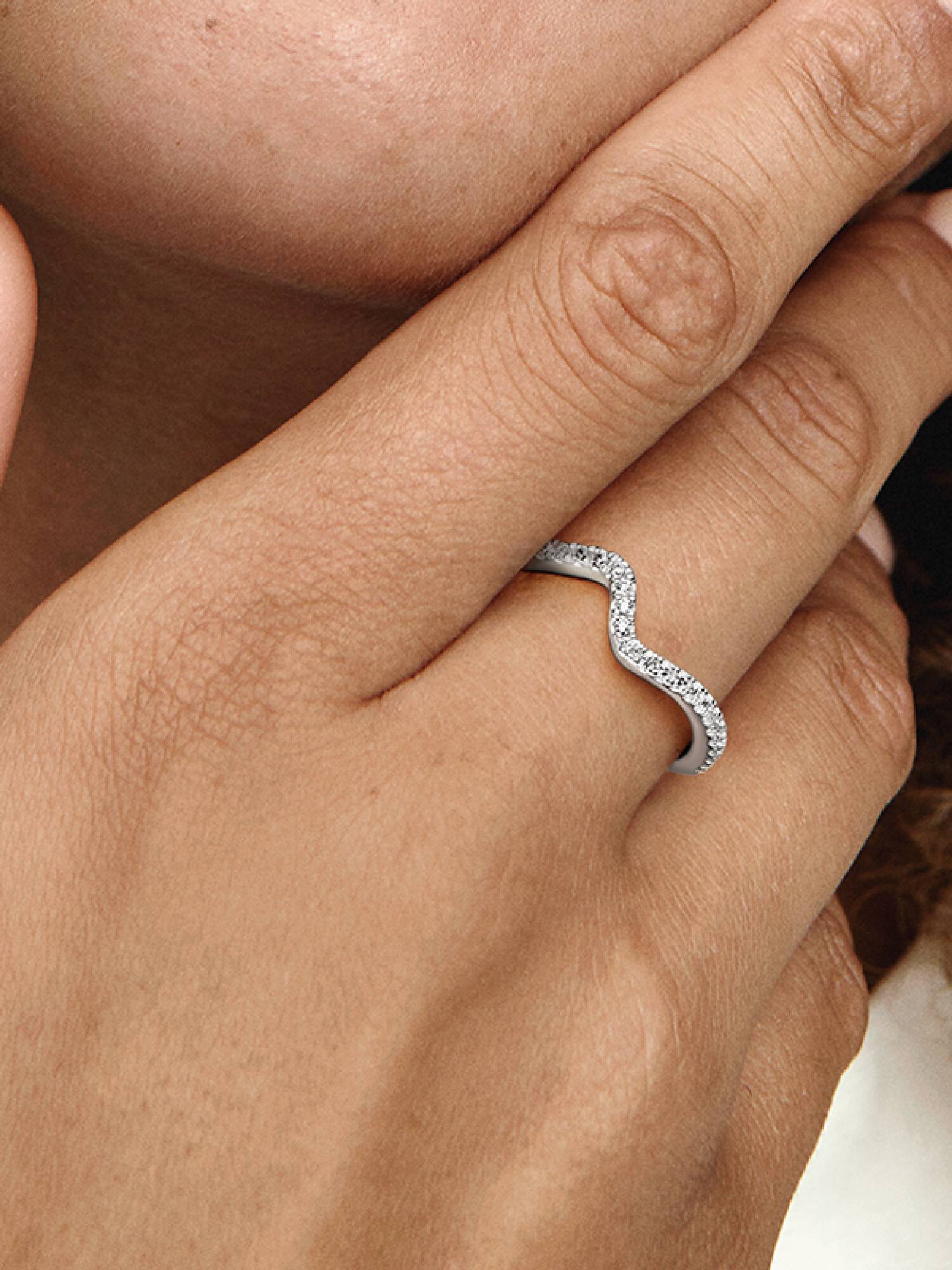 Sparkling Sterling Silver Wave Ring with cubic zirconia