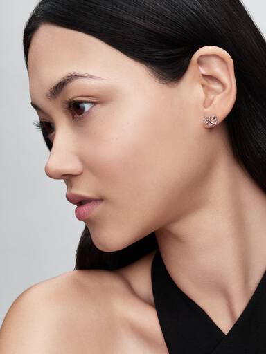 Infinity heart 14k rose gold-plated stud earrings with clear cubic zirconia
